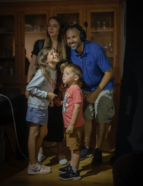 Brad Hasse on set with his family