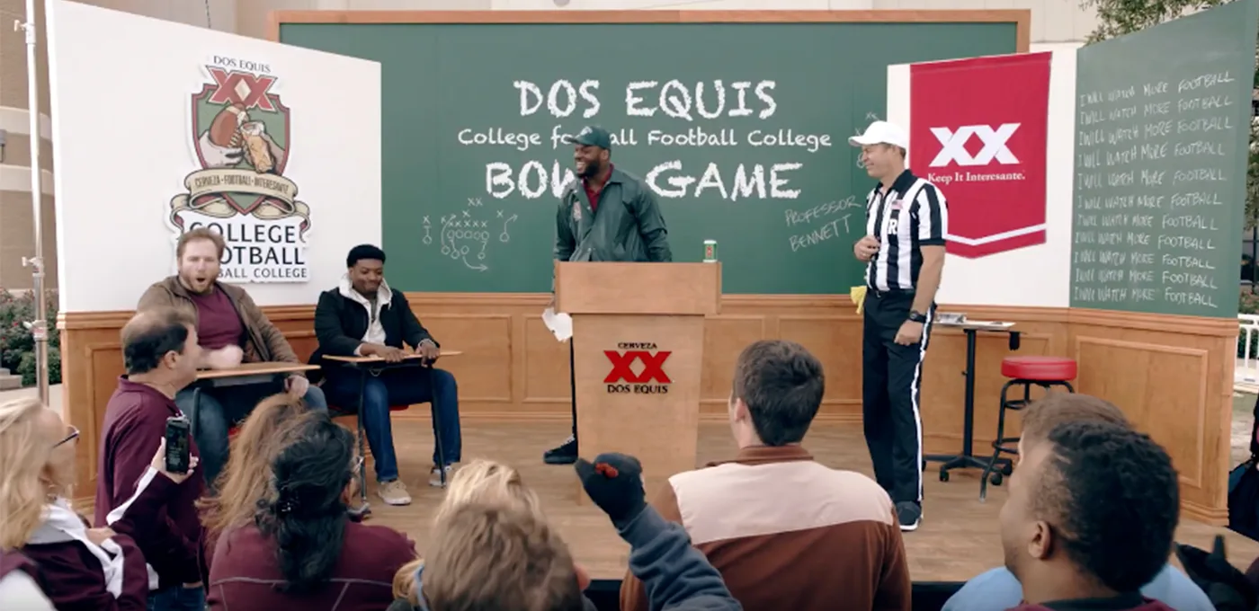 The finished Dos Equis Bowl Game set at the tailgate, built to the same plot, with a real crowd watching